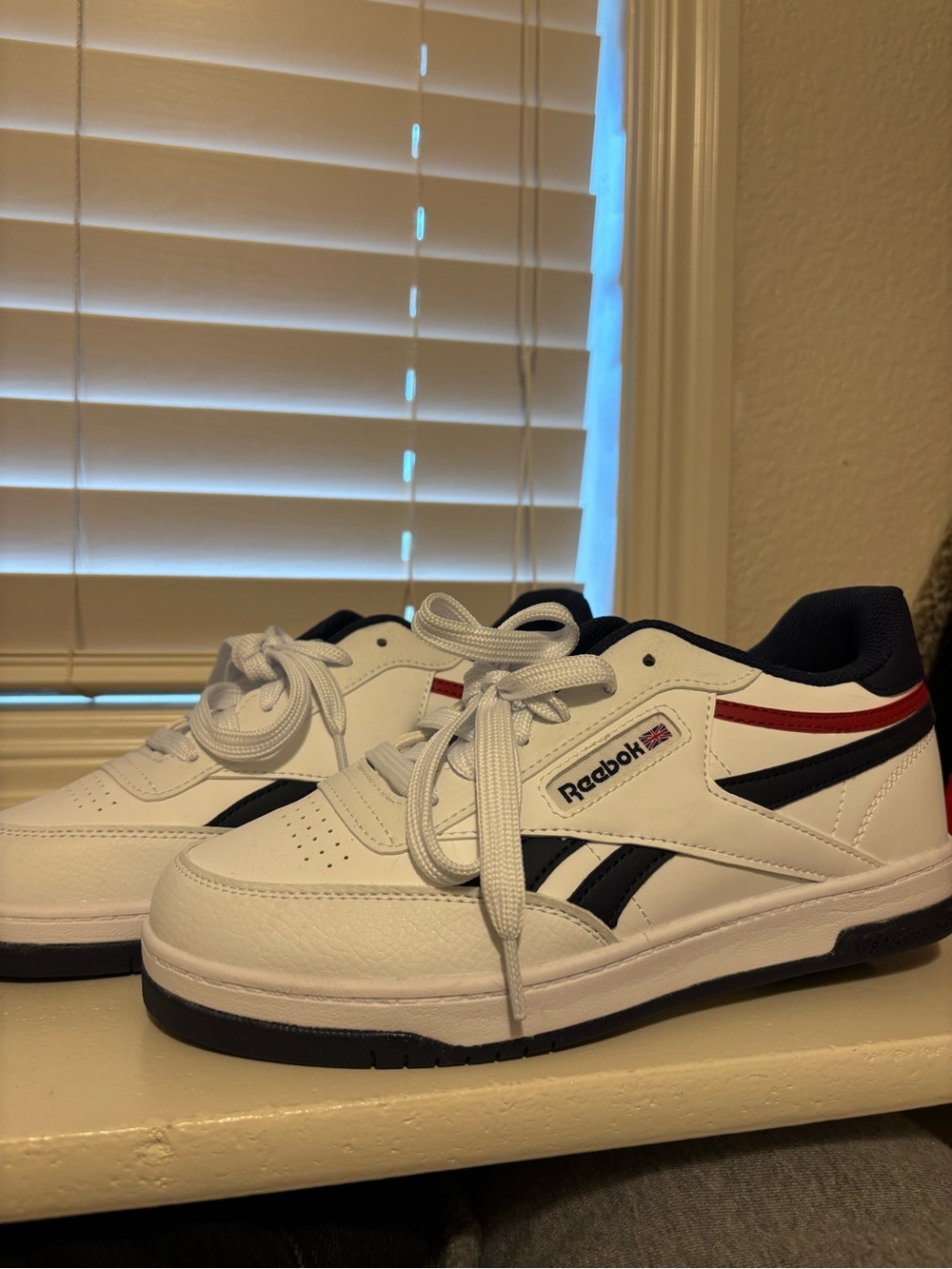 Reebok “Heelys” White Sneakers with Navy & Red Accents